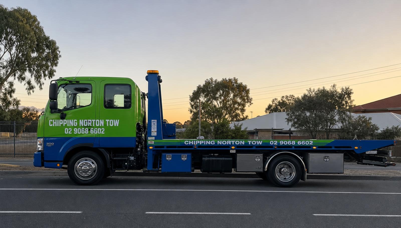 Chipping Norton Tow tow truck with phone number 02 9068 6602 on the door